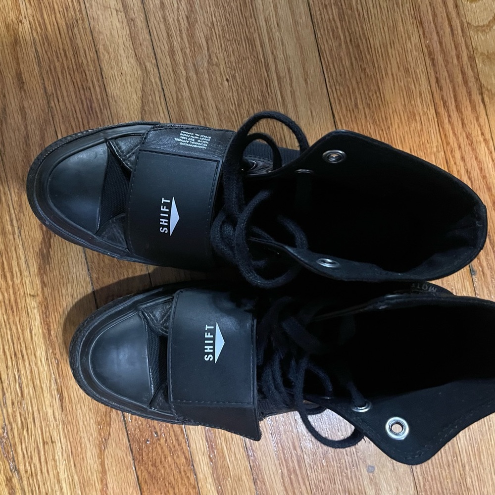 Converse neighborhood motorcycle sneakers.